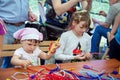 Children participating at art and craft outdoor workshop